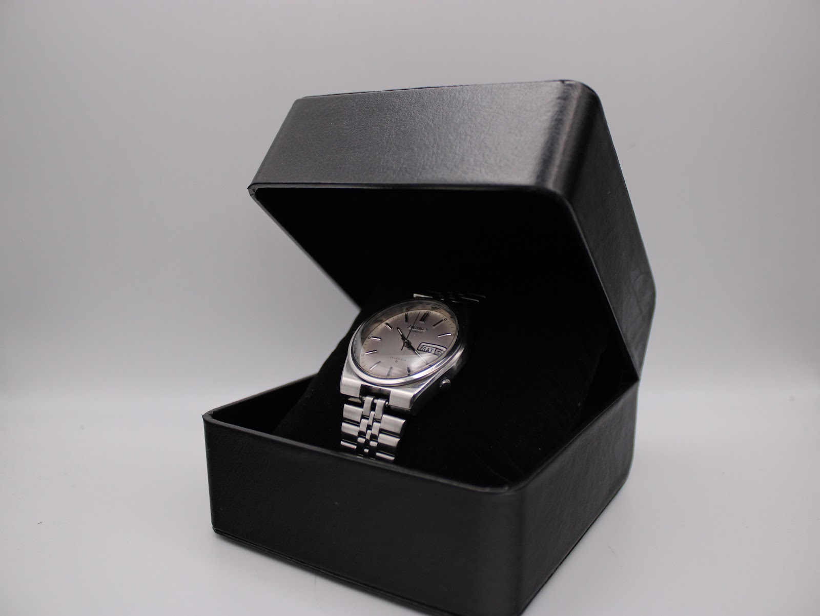 The SEIKO 6309-9000 watch displayed inside an open black watch box.