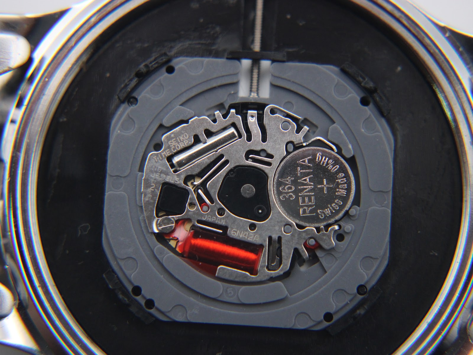 Close-up of the Seiko 6N42A quartz movement inside the watch, with a Renata 364 battery.
