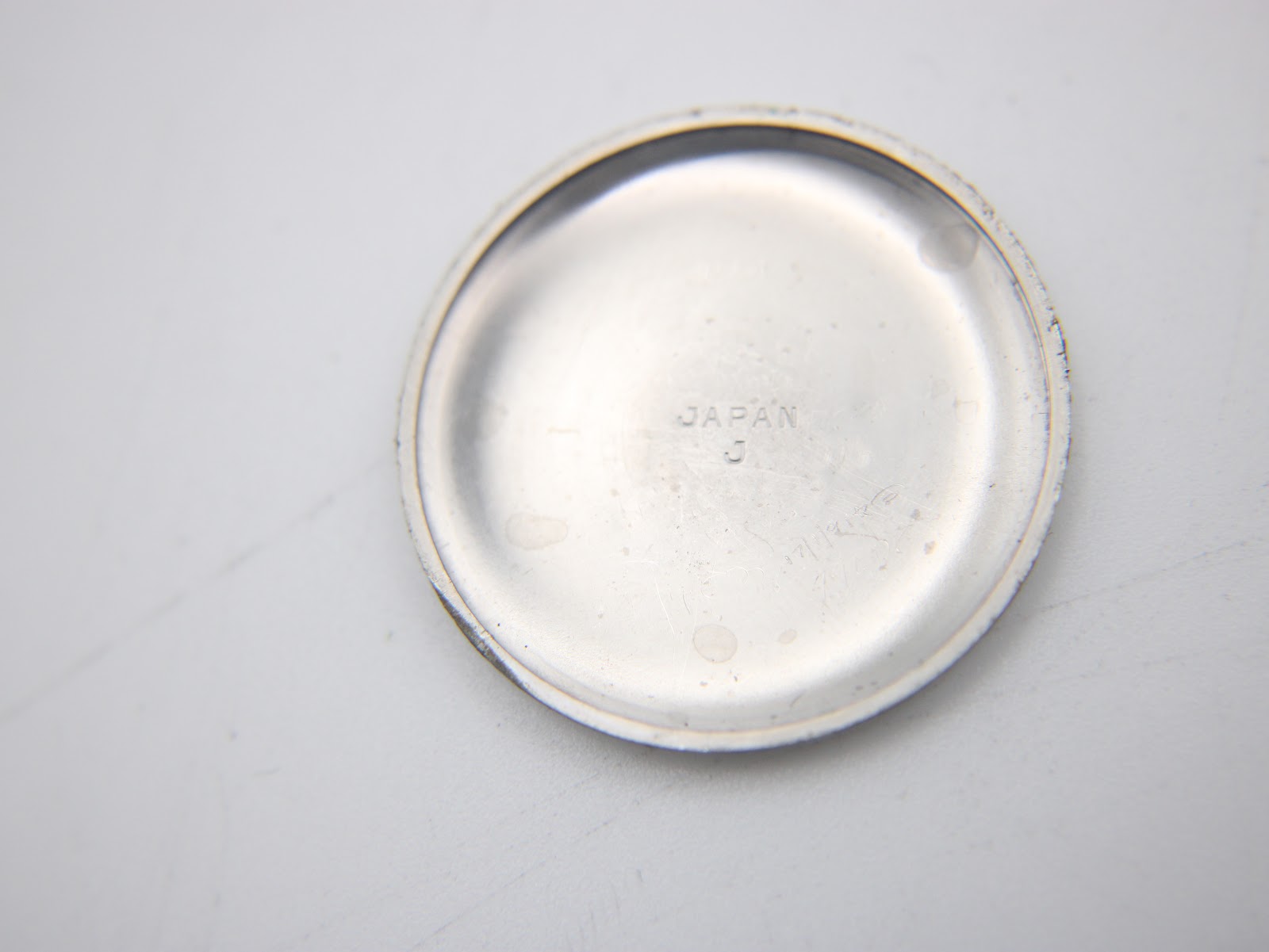 Inner case back view showing 'JAPAN J' inscription.