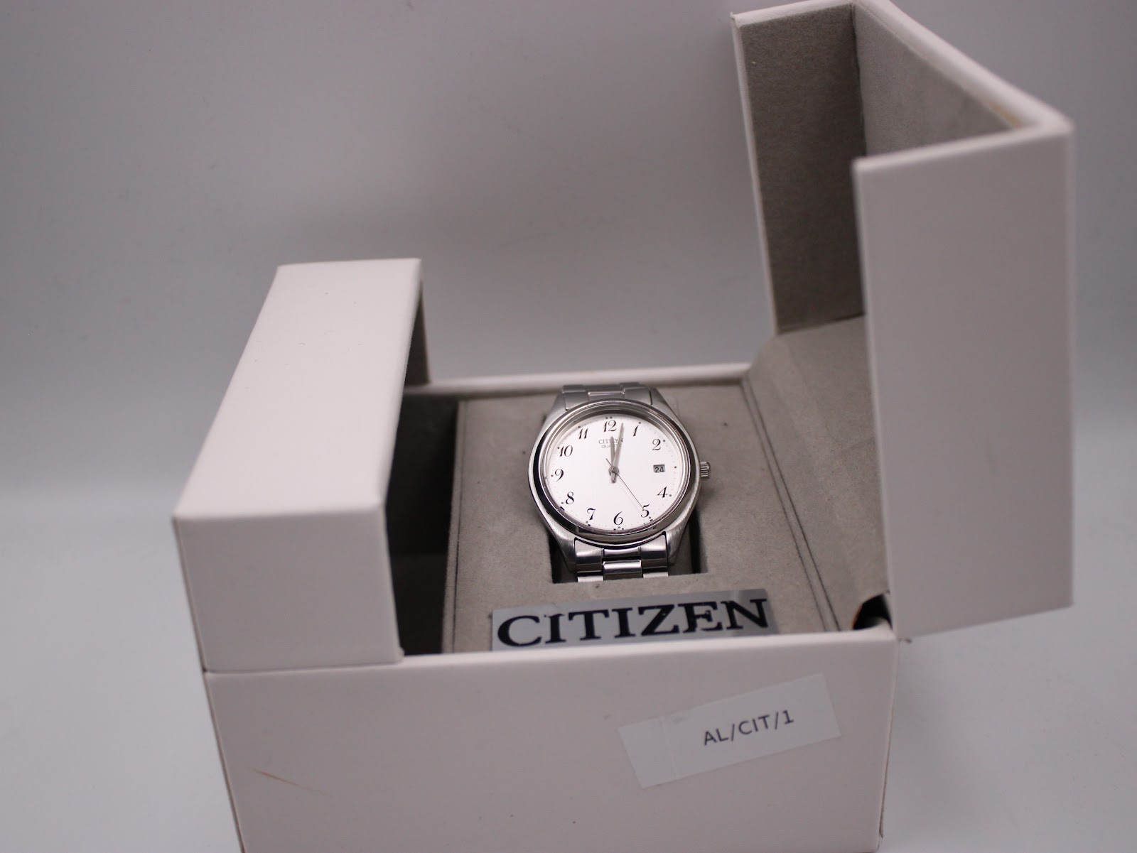 Citizen 6110-S64894 HST watch presented inside its original white Citizen branded box.