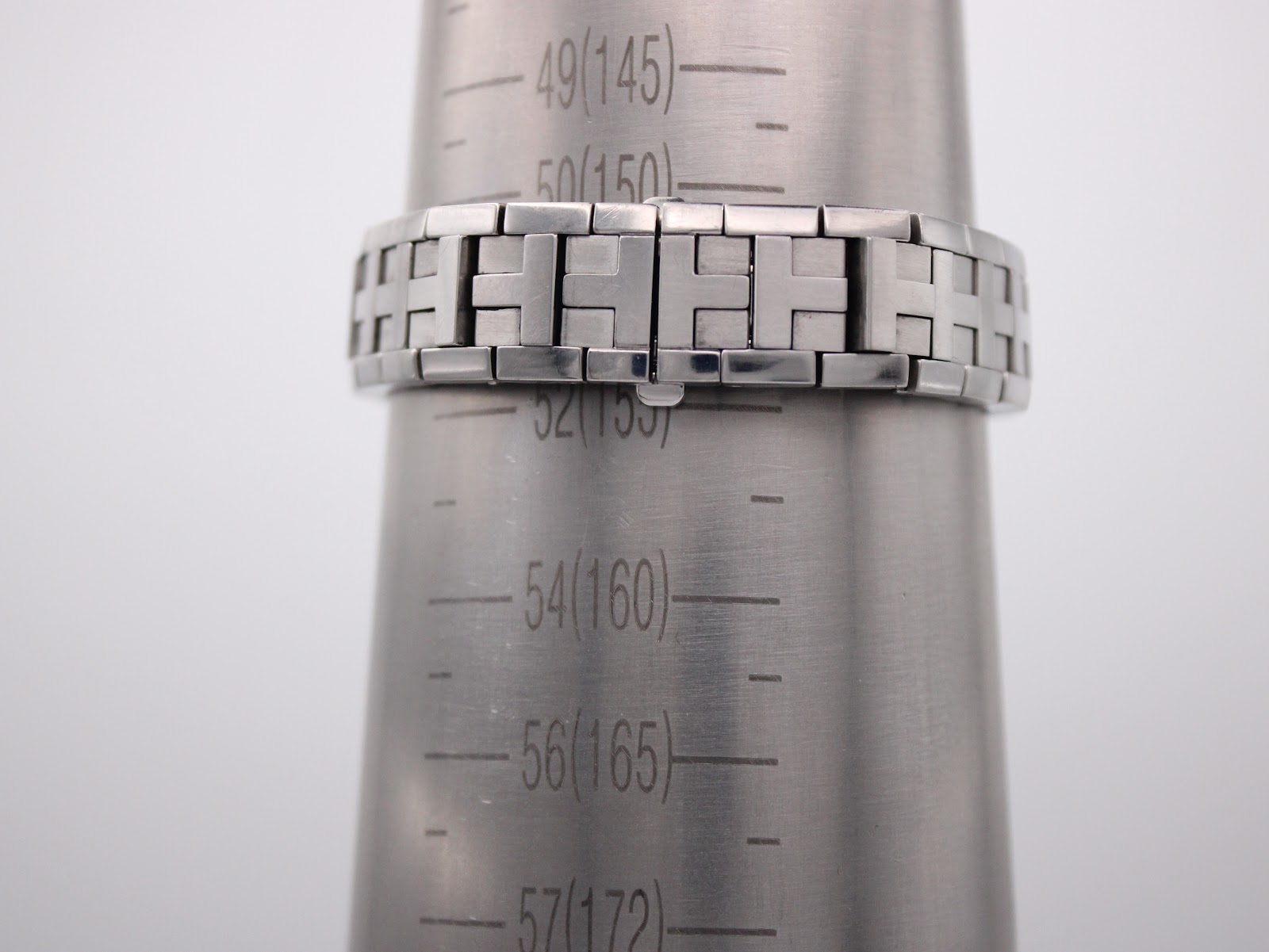 The Tissot L820P bracelet measured on a wrist sizing cone, indicating a wrist circumference of 155mm or 15.5cm.