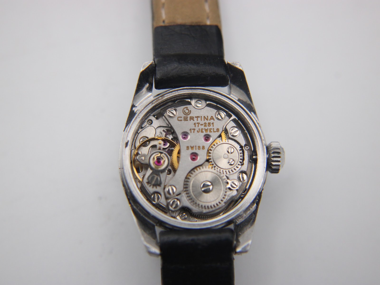 Detailed view of the Certina manual wind 17 jewel movement with engravings 'Certina', '47-351', and 'Swiss'.
