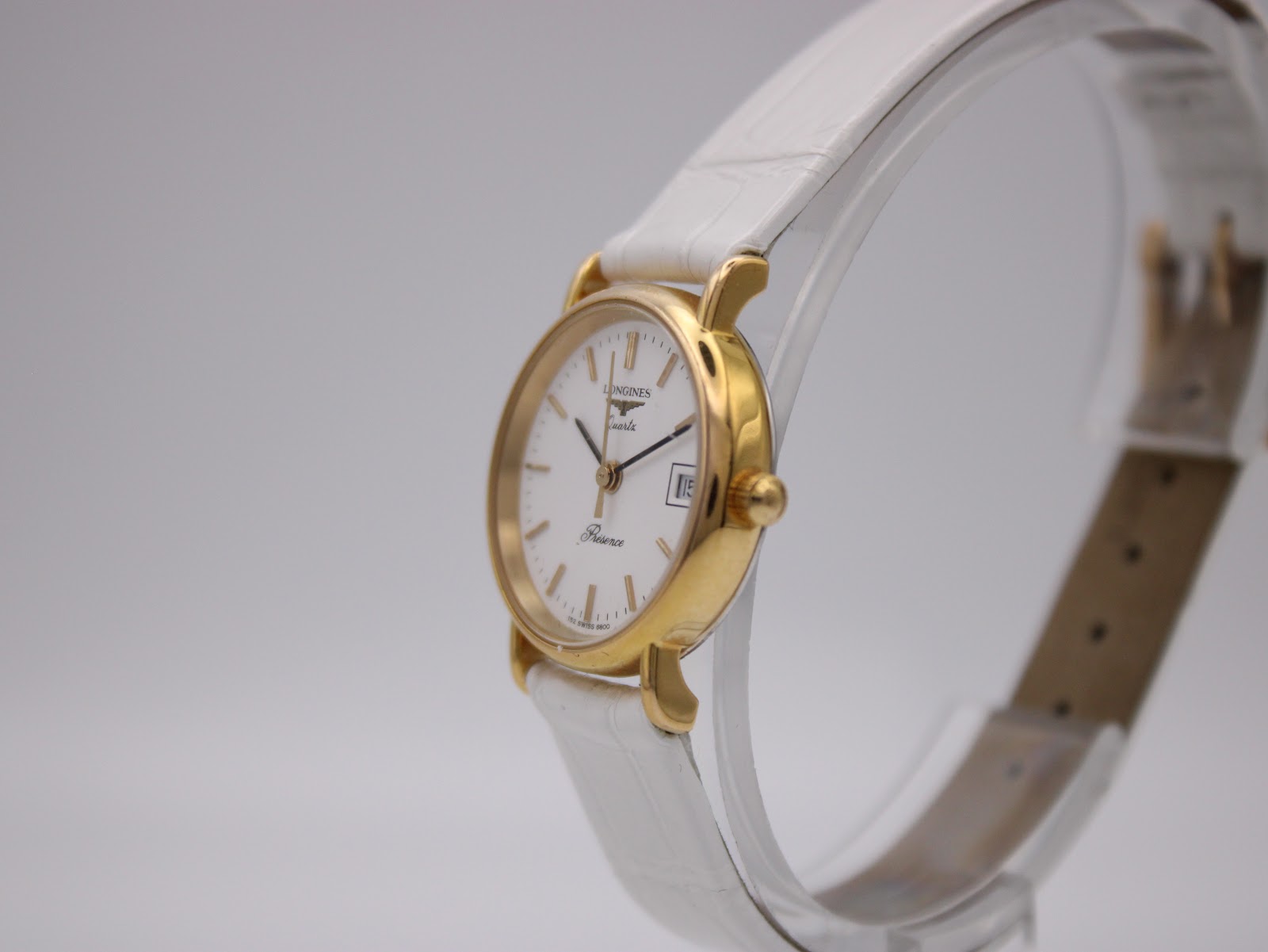 Side profile view of the Longines Presence watch, highlighting the crown and elegant case design.