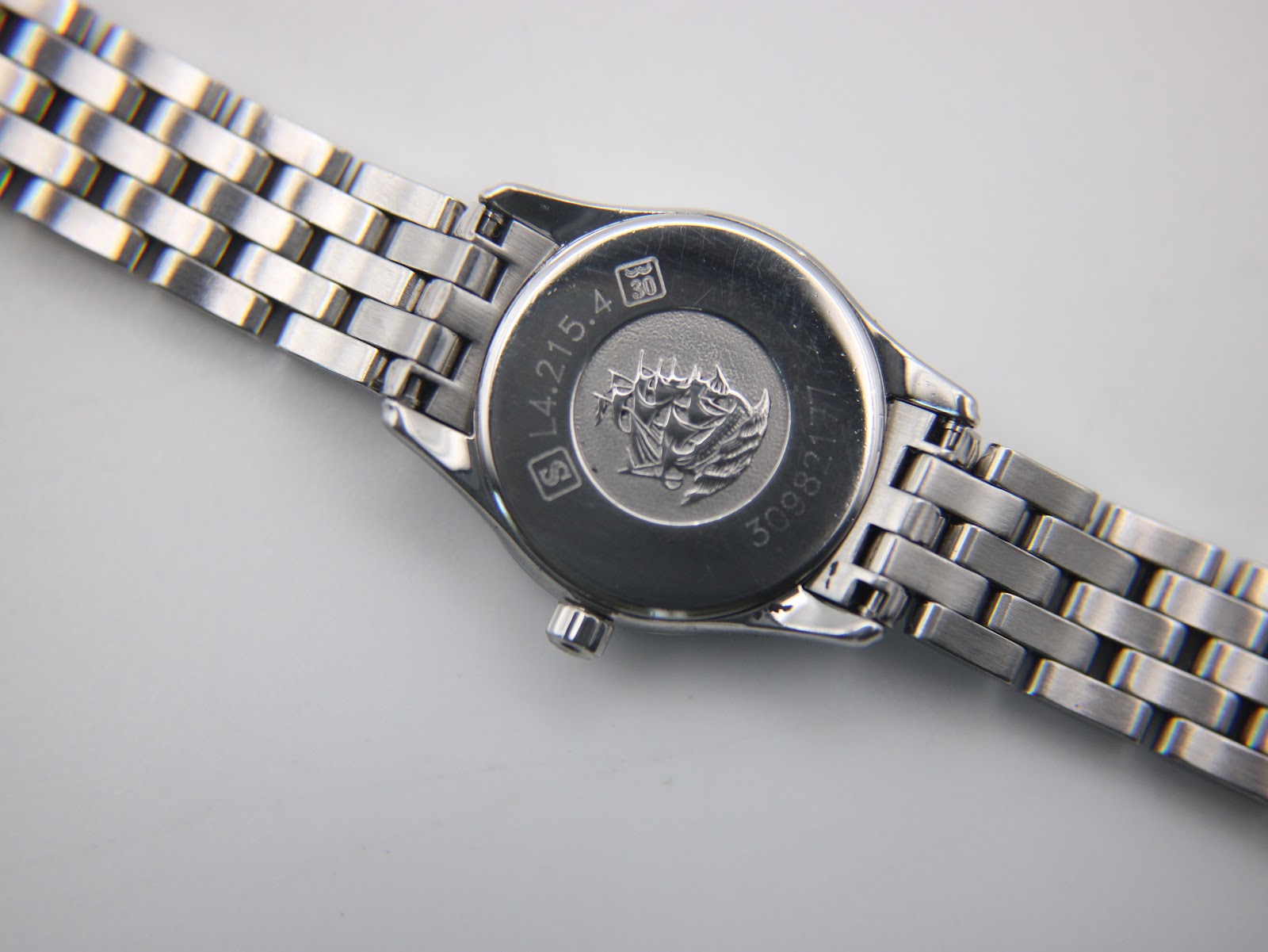 Case back of the Longines L4.215.4 showing the model number, serial number, Longines logo, and 30M water resistance engraving.