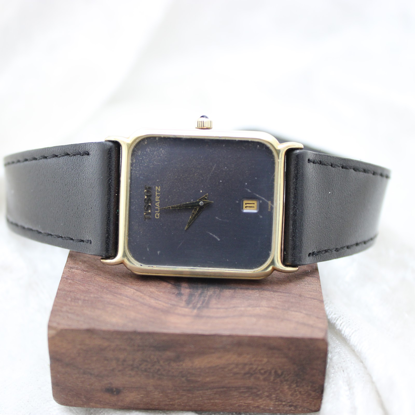 Tissot vintage dress watch worn on a wrist, highlighting its elegant proportions and fit.