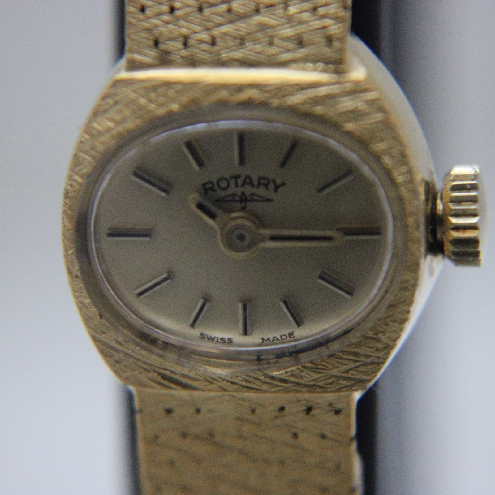 Slightly different close-up of the Rotary dial, focusing on the champagne colour and dauphine hands.