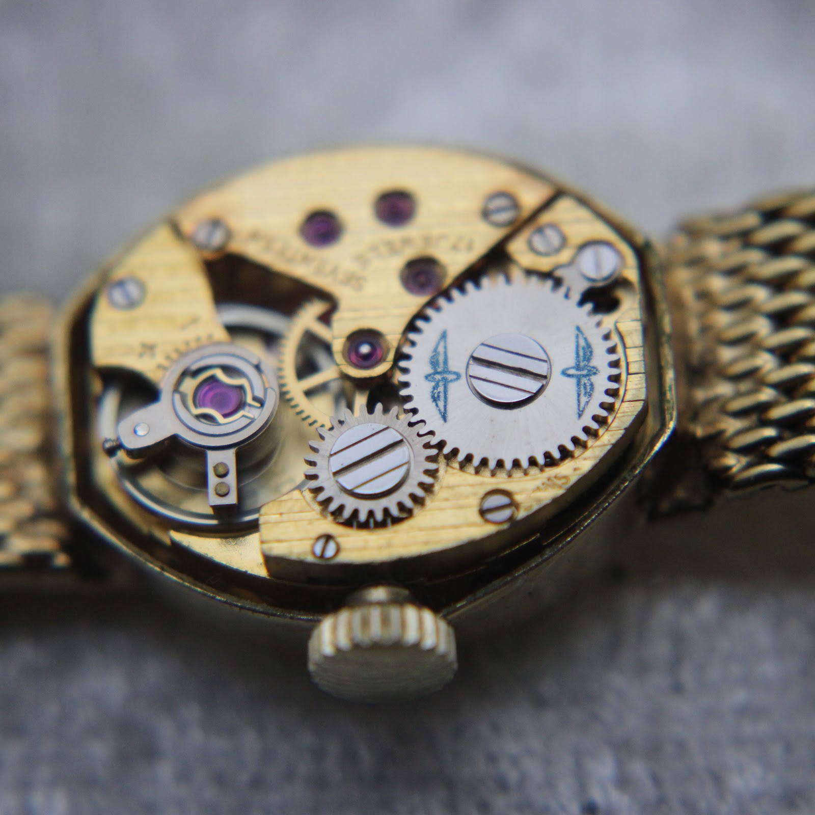 Another close-up macro view of the Swiss manual wind movement, showing 'SEVENTEEN 17 JEWELS' engraving.