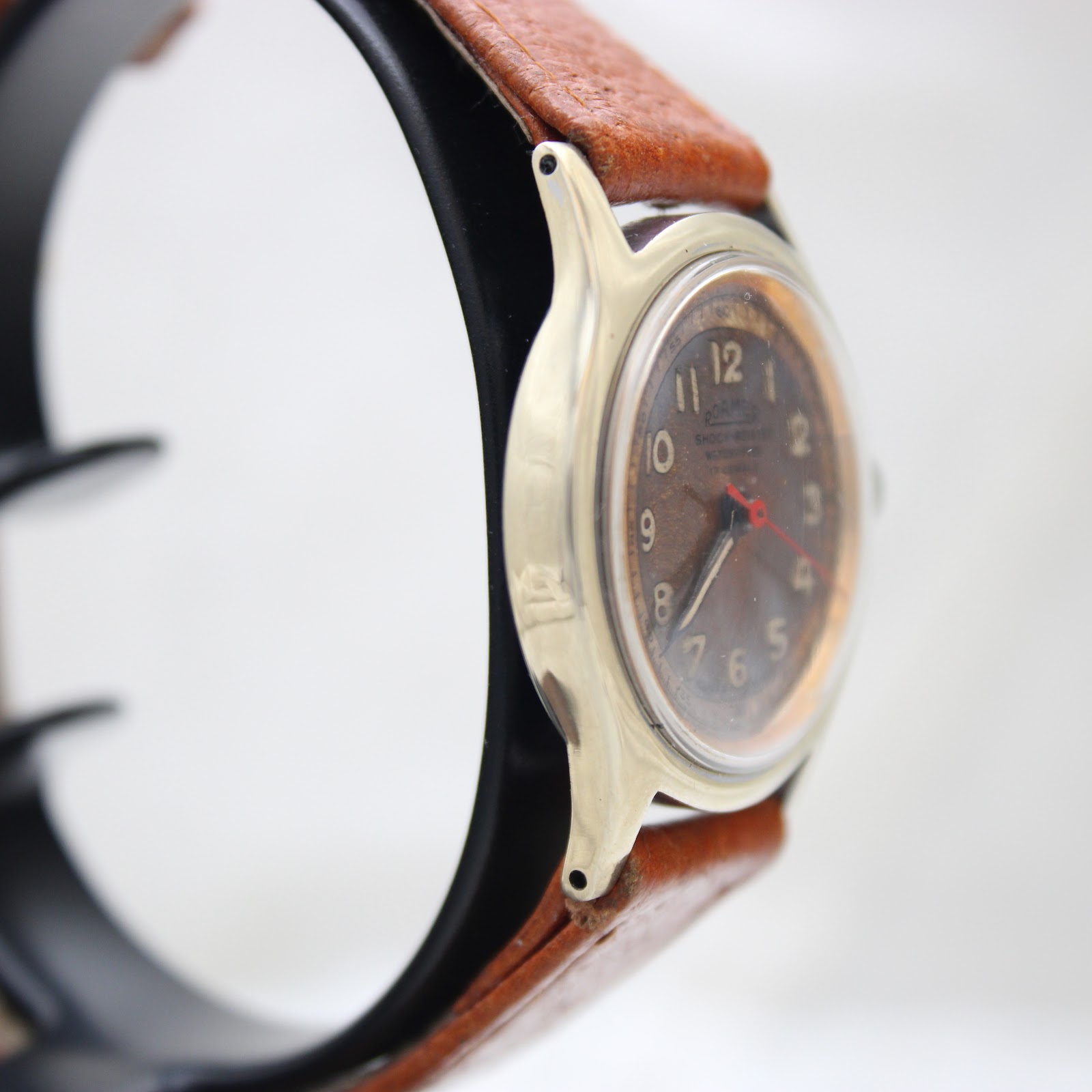 Another side profile of the Roamer watch, displaying the elegant lugs and case design.