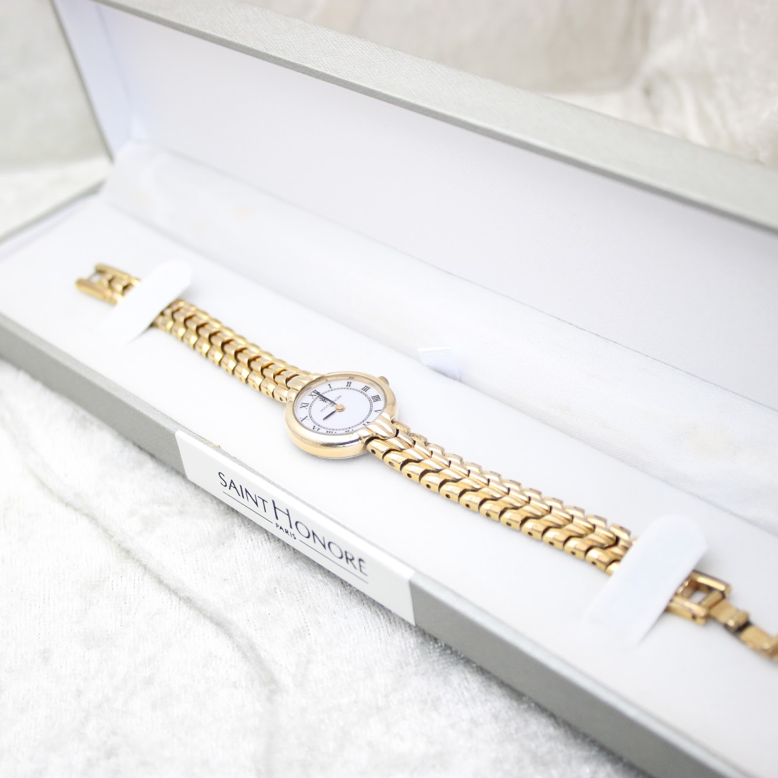 The Saint-Honoré Paris watch presented in an open white display box