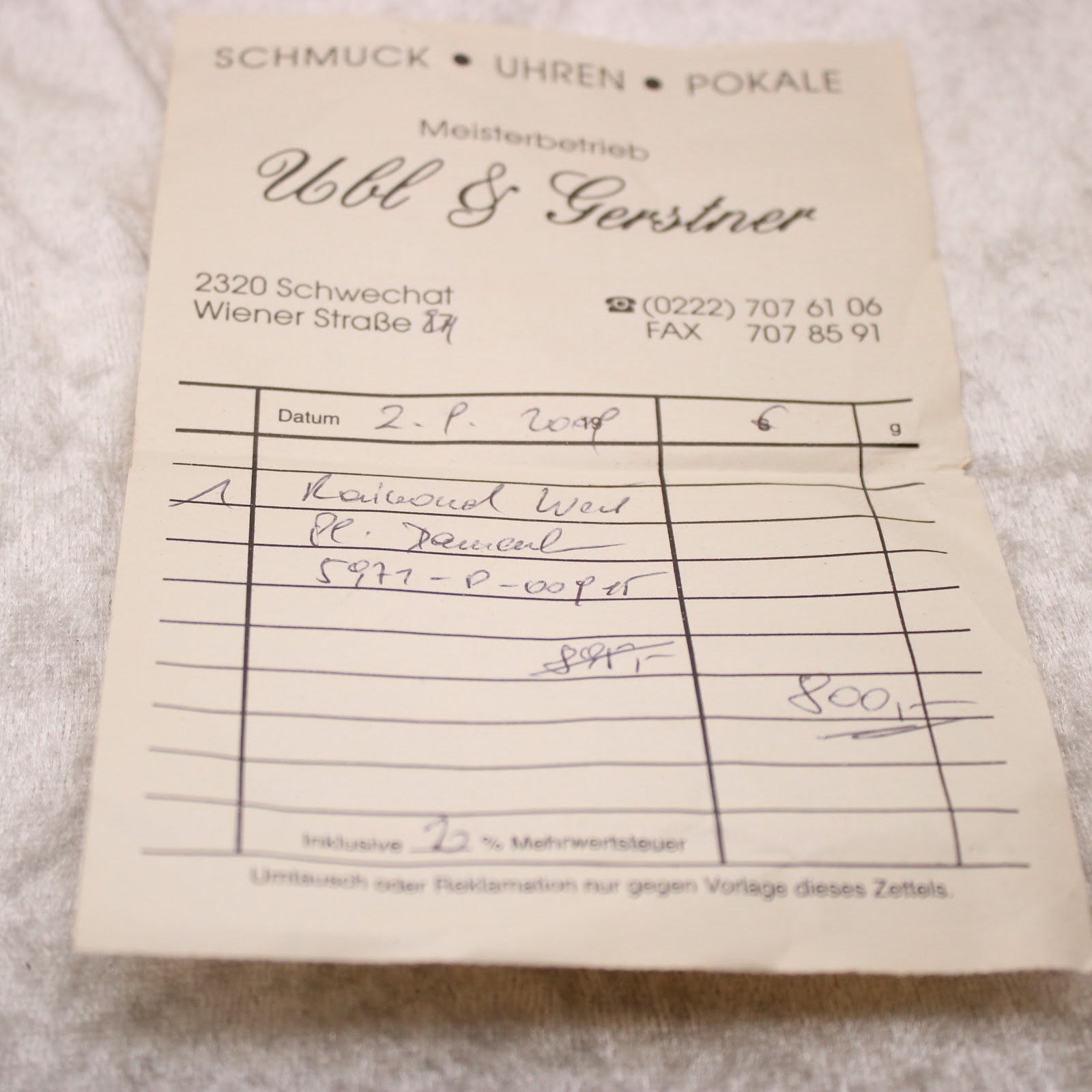 Paper document from a jewellery and watch shop with handwritten details