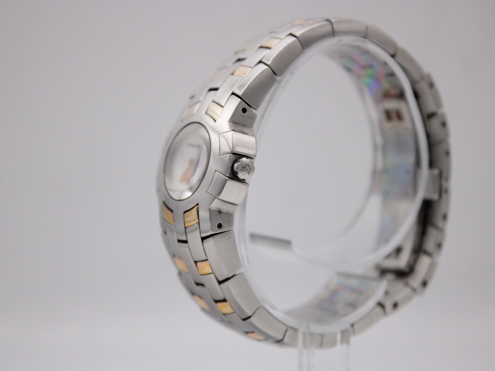 Angled side view of the Maurice Lacroix watch showing the integrated case and bracelet design.