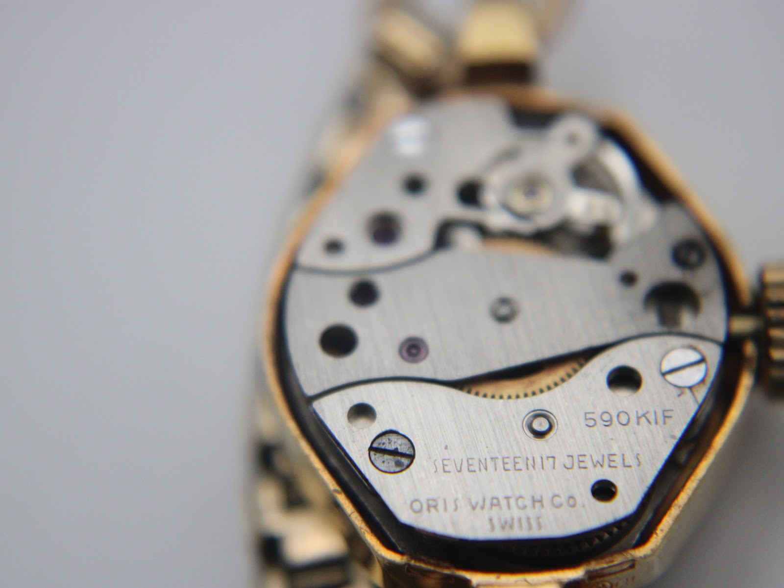Open case back revealing the Oris 590 KIF seventeen jewels manual wind movement.