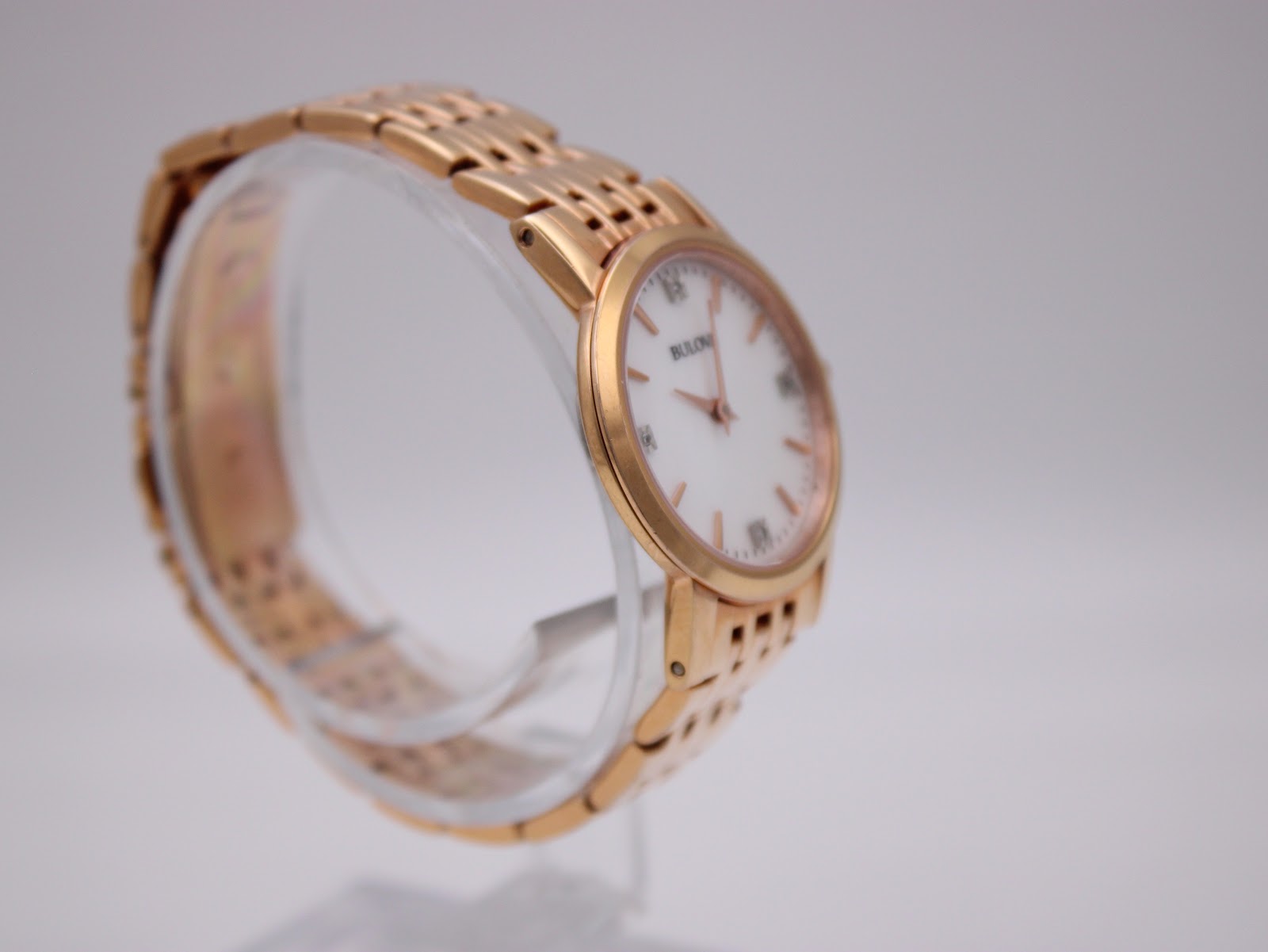 Another side angle view of the Bulova 97P106, showing the curved profile of the case and bracelet.