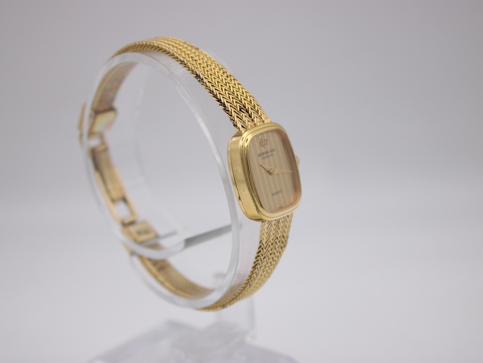 Side view of the Raymond Weil 5707 watch, highlighting the integrated woven bracelet and slim profile.