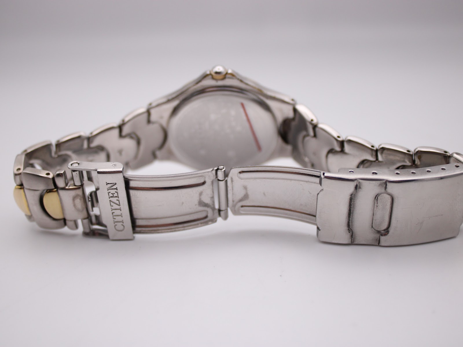 Close-up of the bracelet's folding clasp, clearly showing the "CITIZEN" signature.